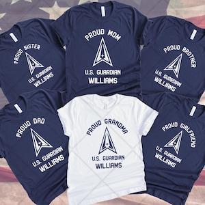 May include: Navy blue and white t-shirts with the text "Proud Sister", "Proud Mom", "Proud Brother", "Proud Dad", "Proud Grandma", and "Proud Girlfriend". Each shirt features a graphic and the text "U.S. Guardian Williams".