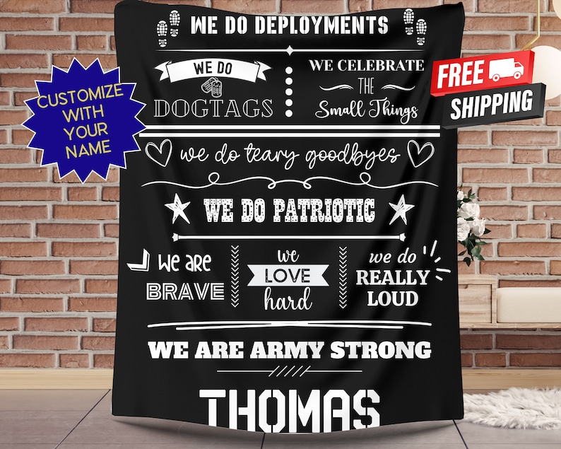 May include: Black blanket with white text. The blanket reads "We Do Deployments," "We Do Dogtags," "We Celebrate The Small Things," and "We Are Army Strong." The name "Thomas" is at the bottom. A blue starburst says "Customize With Your Name."