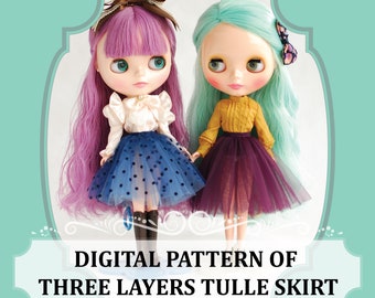 May include: Digital pattern for a three-layer tulle skirt. The pattern is shown on two dolls, one with purple hair and a blue skirt with white polka dots, and the other with turquoise hair and a burgundy skirt.