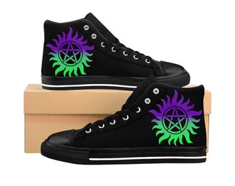 May include: Black high-top canvas sneakers with a green, purple, and blue gradient print of a pentagram inside a circle with flames. The shoes are on a brown box.