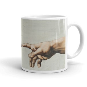 Michelangelo Hands of God and Adam Mug. Detail from The Creation of Adam from the Sistine Chapel. Ideal Tea/Coffee Gift Mug