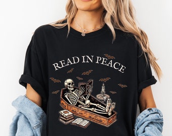 Read in Peace shirt, Skeleton Book Shirt, Skeleton Reading shirt, Book Lover Halloween tee, Reading Shirt, Bookish Gift, Halloween shirt