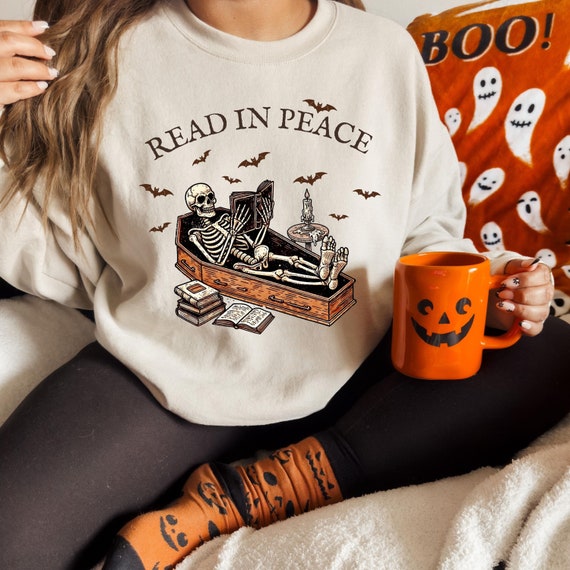 Read in Peace Sweatshirt, Skeleton Book Shirt, Skeleton Reading shirt, Book Lover Halloween,Halloween Crewneck, Bookish Halloween Sweatshirt