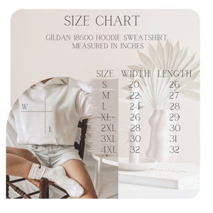 May include: Size chart for a Gildan 18500 hoodie sweatshirt, measured in inches. The chart shows sizes S through 4XL with corresponding width and length measurements.