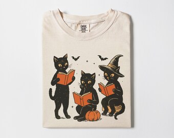 Halloween Comfort Colors Spooky Cat Book Lovers T-Shirt, Halloween Gift, Unisex Tee, Fall shirt, Cat Lover, Witchy Vibes, Bookish halloween