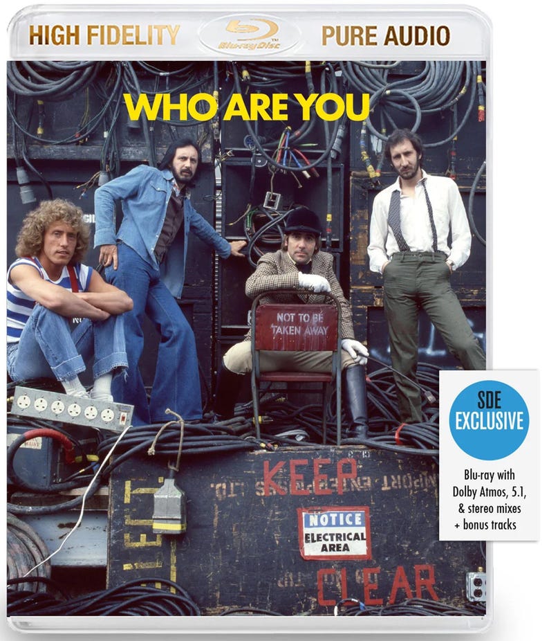 May include: Blu-ray disc of "Who Are You" by The Who. The cover features the band members in a backstage setting with cables and equipment. The disc includes Dolby Atmos, 5.1, and stereo mixes, plus bonus tracks.