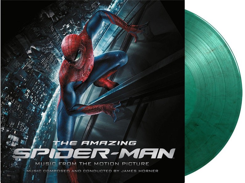Pu&ograve; includere: Un disco in vinile verde con un'immagine di Spider-Man sulla copertina. La copertina presenta il testo "The Amazing Spider-Man" e "Music from the Motion Picture".