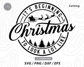 May include: Black and white graphic design with a circular border and the text "It's Beginning to Look a Lot Like Christmas". The design features a silhouette of Santa Claus in his sleigh with reindeer flying through the air.