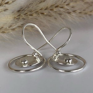 Beautiful hand textured Sterling silver earrings perfect for  day or night!