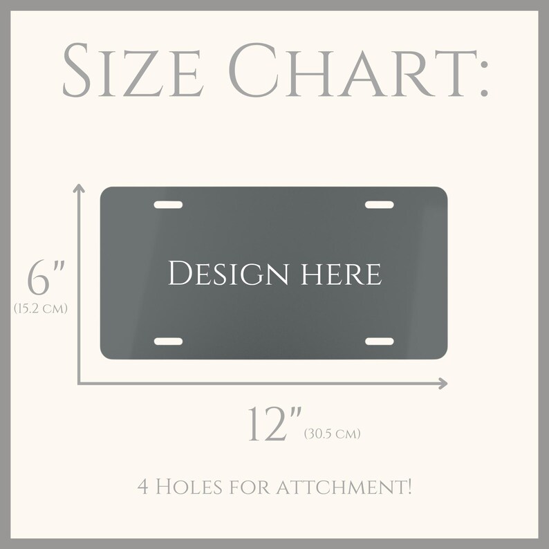 May include: A gray metal license plate template with four holes for attachment. The template measures 12 inches by 6 inches and has the text "DESIGN HERE" printed in white.