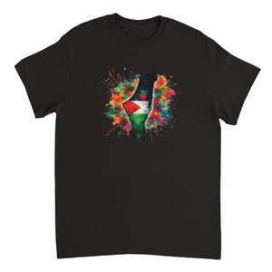 May include: Black t-shirt featuring a colorful watercolor design of the Palestinian flag within the shape of the country. The design includes red, white, green, and black colors with vibrant paint splatters around the flag.