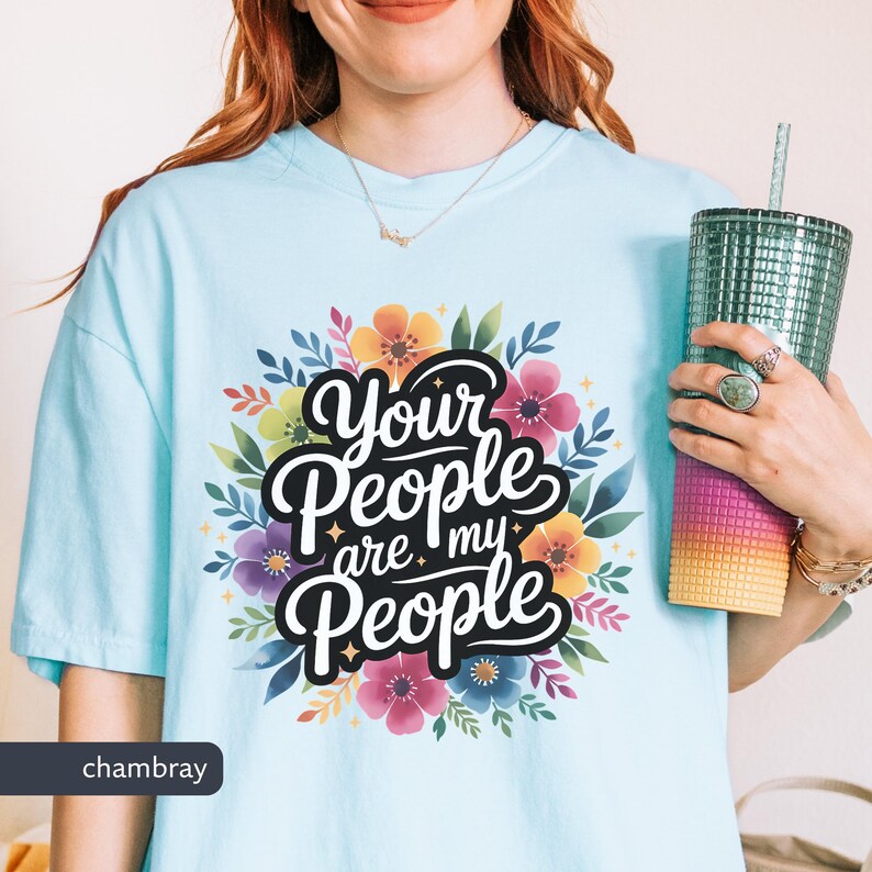 Jewish Comfort Colors T-shirt with Book of Ruth Bible Quote Your People are my People in handwritten cursive over watercolor flowers under it the text is white with black shadowing. Megillat Rut verse for Shavuot Ruth and Naomi famous quote inspiring Jewish t-shirt Biblical women gift for Jewish woman gift for Jewish man convert to Judaism Jews by choice conversion gift