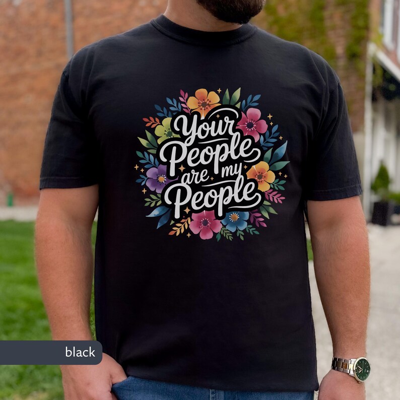 Jewish Comfort Colors T-shirt with Book of Ruth Bible Quote Your People are my People in handwritten cursive over watercolor flowers under it the text is white with black shadowing. Megillat Rut verse for Shavuot Ruth and Naomi famous quote inspiring Jewish t-shirt Biblical women gift for Jewish woman gift for Jewish man convert to Judaism Jews by choice conversion gift