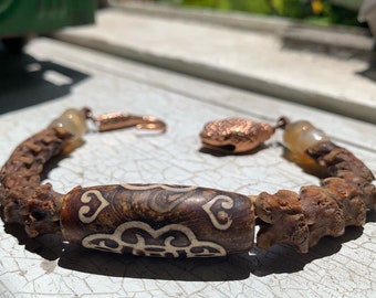 SOLD Unisex snake vertebrae, carnelian bloodstone, DZI Tibetan DZI agate focal bead and copper snake head and tail artisan clasp