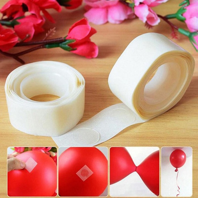 May include: Two rolls of clear adhesive tape with round adhesive dots. The tape is used to attach balloons to surfaces. The image shows examples of how to use the tape to attach balloons to each other and to a wall.