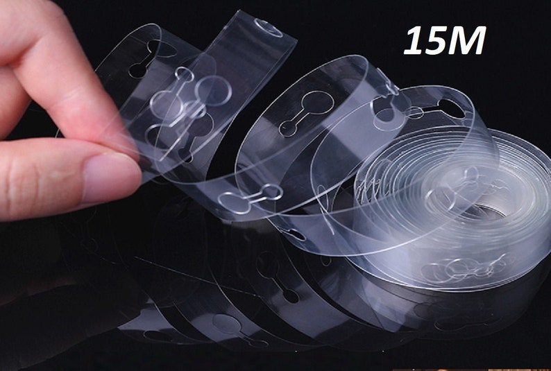 May include: Clear plastic balloon arch kit with 15 meters of tape. The tape has evenly spaced holes for tying balloons.