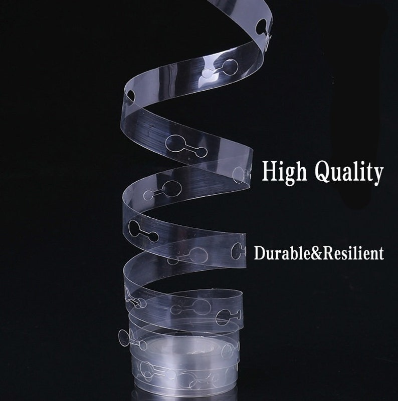 May include: Clear plastic balloon arch strip with small holes for tying balloons. The strip is coiled and has the text "High Quality Durable & Resilient" printed on the side.
