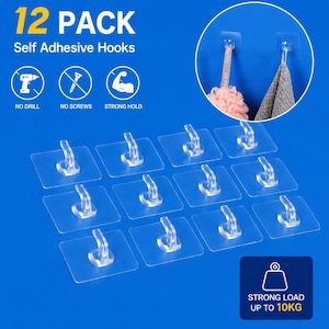 May include: A pack of 12 clear, self-adhesive hooks. The packaging text reads "12 PACK Self Adhesive Hooks" and "Strong Load Up To 10KG". The hooks are displayed on a blue background, with two hooks in use holding a loofah and a towel.