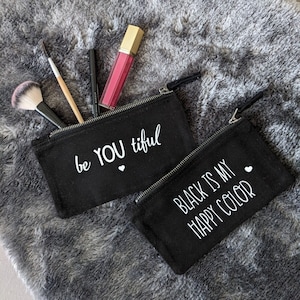 Cosmetic bag, travel first aid kit, black with statement (saying)