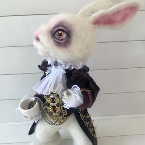 THE WHITE RABBIT from Alice in Wonderland is Needle Felted and one of a kind. It's a unique gift for someone special who loves plushies.