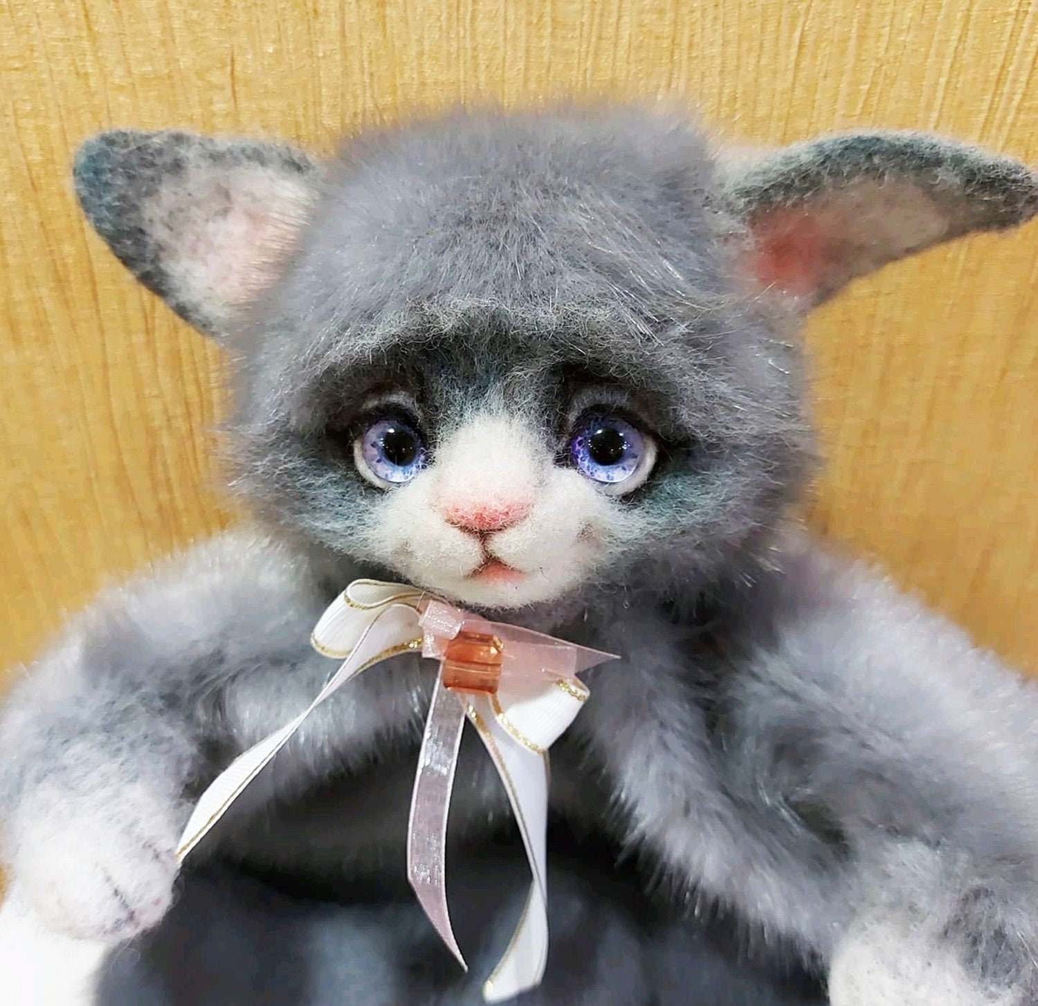 cat hugging plush