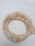 Frosted dainty white African waist beads with a hint of gold and silver