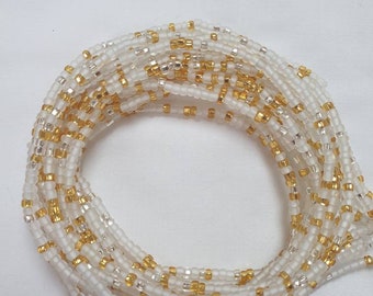 Frosted dainty white African waist beads with a hint of gold and silver