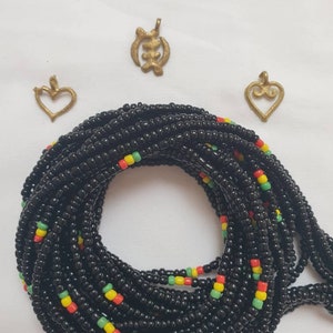 Black African waist beads with red, yellow and green beads