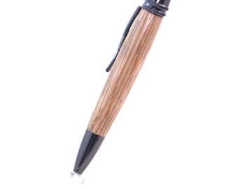May include: A wooden pen with a black metal cap and tip. The pen has a natural wood grain pattern.
