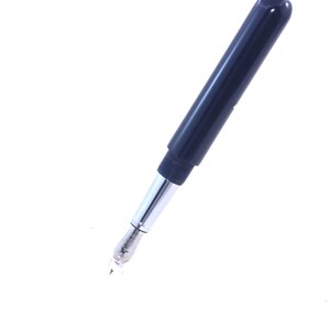 May include: A black fountain pen with a silver nib and a black cap.