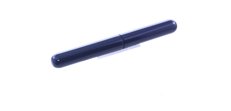 May include: A dark blue pen with a silver clip.