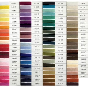 May include: A colour chart of DMC embroidery floss with a variety of colours, including red, orange, yellow, green, blue, purple, brown, black, and white. The chart is organised by colour number, with each colour represented by a small, rectangular swatch of floss.