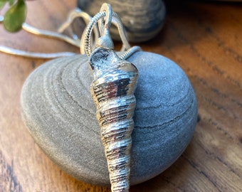 Cast silver tower shell pendant