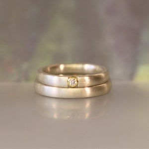 Couple rings No. 1, brilliant 0.05 ct, silver 925, gold 750, each ring individually hand-forged, wedding rings, engagement rings, friendship rings.