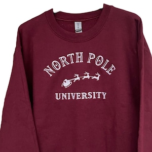 North Pole University self-embroidered Christmas sweater