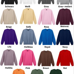 May include: A collection of crewneck sweatshirts in various colors, including black, white, gray, beige, yellow, pink, purple, blue, navy, brown, orange, green, and red. Each sweatshirt has the color name displayed below it.