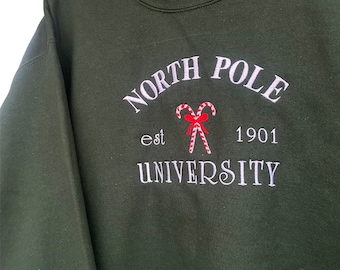 Self-embroidered Christmas sweater North Pole University candy canes