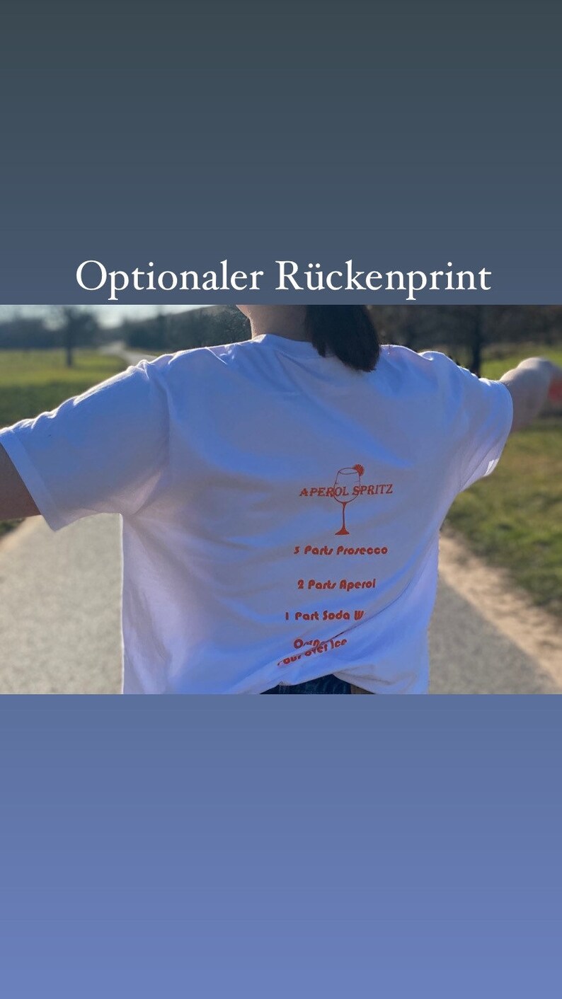 May include: White t-shirt featuring an Aperol Spritz recipe on the back, including Prosecco, Aperol, and soda water. The shirt also has the text "Optionaler R&uuml;ckenprint" at the top.