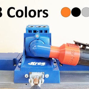 May include: A blue and orange Kreg jig with a black handle. The jig has a blue base with a Kreg logo and a black handle with the text "Kreg K5".