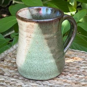Handmade pottery mug, rustic stoneware, tan and green
