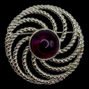 vintage broche spirale en argent Eammons - épinglette cabochon thermodurcissable violet Mid-Century violet