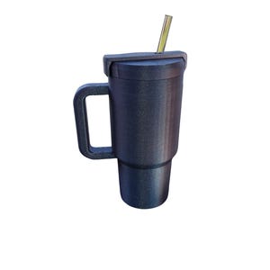 May include: A dark charcoal gray tumbler with a textured, glittery finish, featuring a sturdy side handle, a matching lid, and a straight metallic straw inserted through the top opening. The vessel has a tapered base and a cylindrical body.