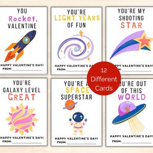 May include: A set of 12 Valentine's Day cards with space-themed designs. Each card features a unique message like "You're My Shooting Star" and "You're Out of This World," with illustrations of rockets, planets, and stars. The cards have space for a personalized message.