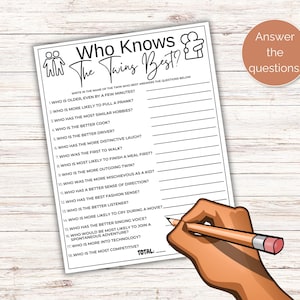 May include: A printable game for twins called "Who Knows The Twins Best?" with 18 questions to answer about each twin. The game is black and white with a hand holding a pencil writing on the page.