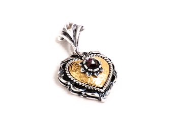 Heart pendant in sterling silver 925/- with garnet stone