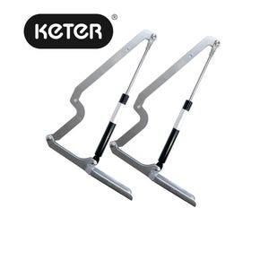 May include: Two silver-toned Keter brand cabinet door supports with black and white detailing. The supports have a curved design and are angled downwards. The Keter logo is in a black oval.