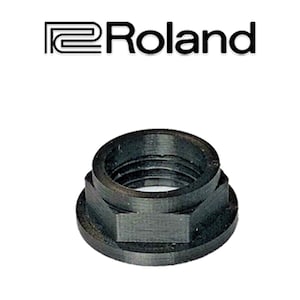 以下が含まれることがあります： 中央にねじ穴のある六角形の黒いプラスチックナットです。