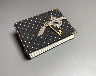 Blank Journal for Writing/Sketching Hand made, Lock & Key (non-locking), Hard Cover, 50# Canson Paper, 5-3/4" x 4", 128 pages, custom pages.