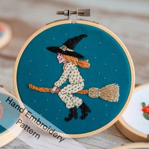 May include: Hand embroidery pattern of a witch flying on a broomstick against a teal background with white stars. The witch is wearing a black hat and a patterned dress.