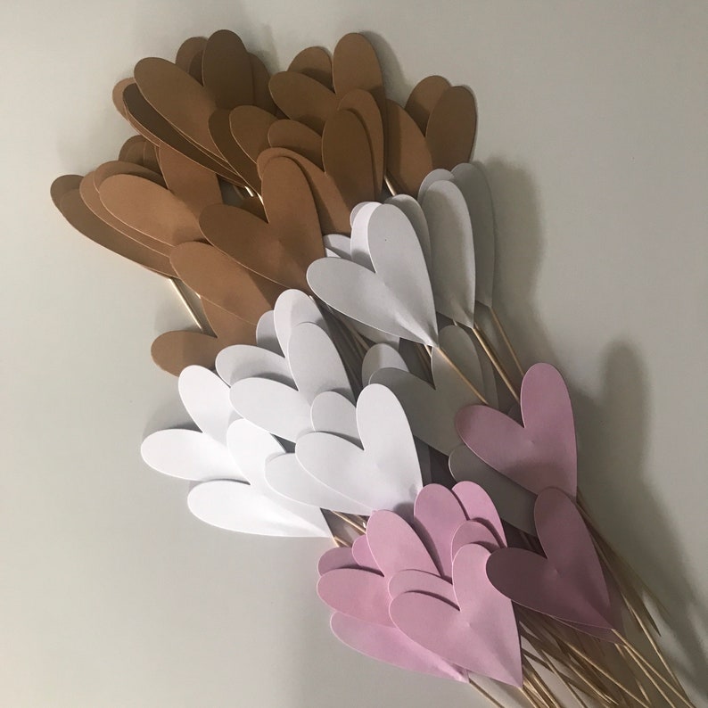 Heart made of colored cardboard on a wooden pick to decorate a ceremonial aisle at a wedding or baptism or event image 3